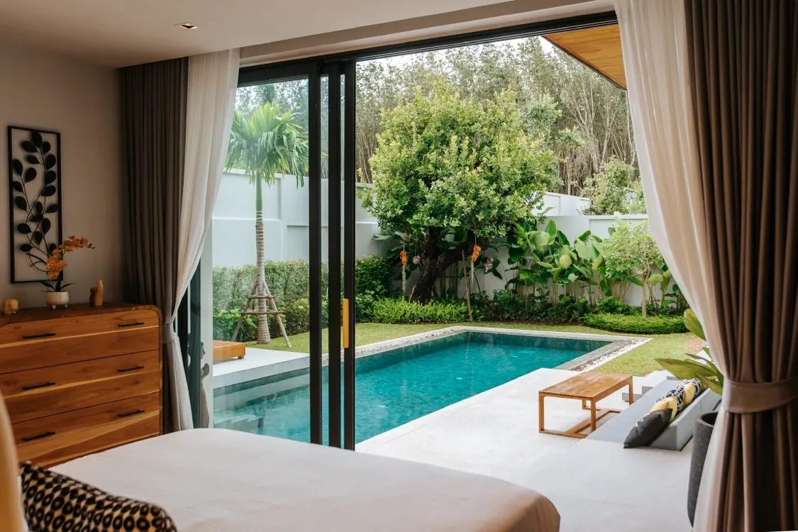 Bedroom opening to pool