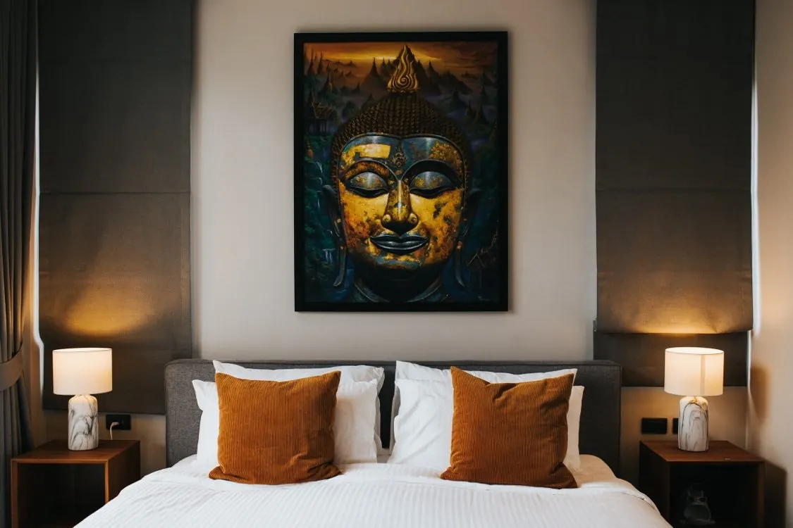 Bedroom with Buddha artwork